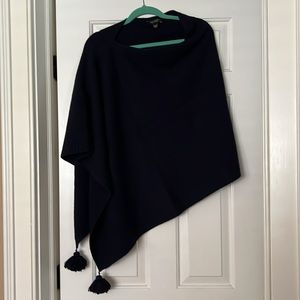 Ann Taylor navy poncho with cashmere. Super cute pom poms on the end.